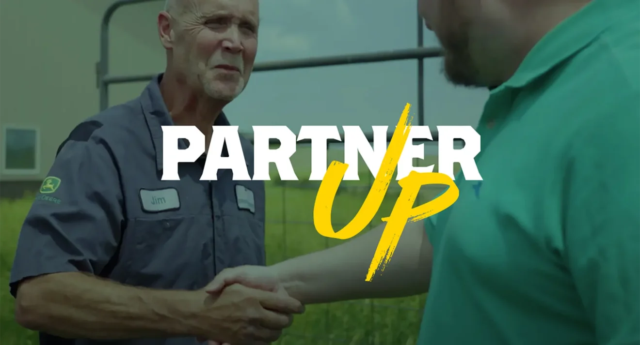 Two farmers shaking hands confirming their partnership