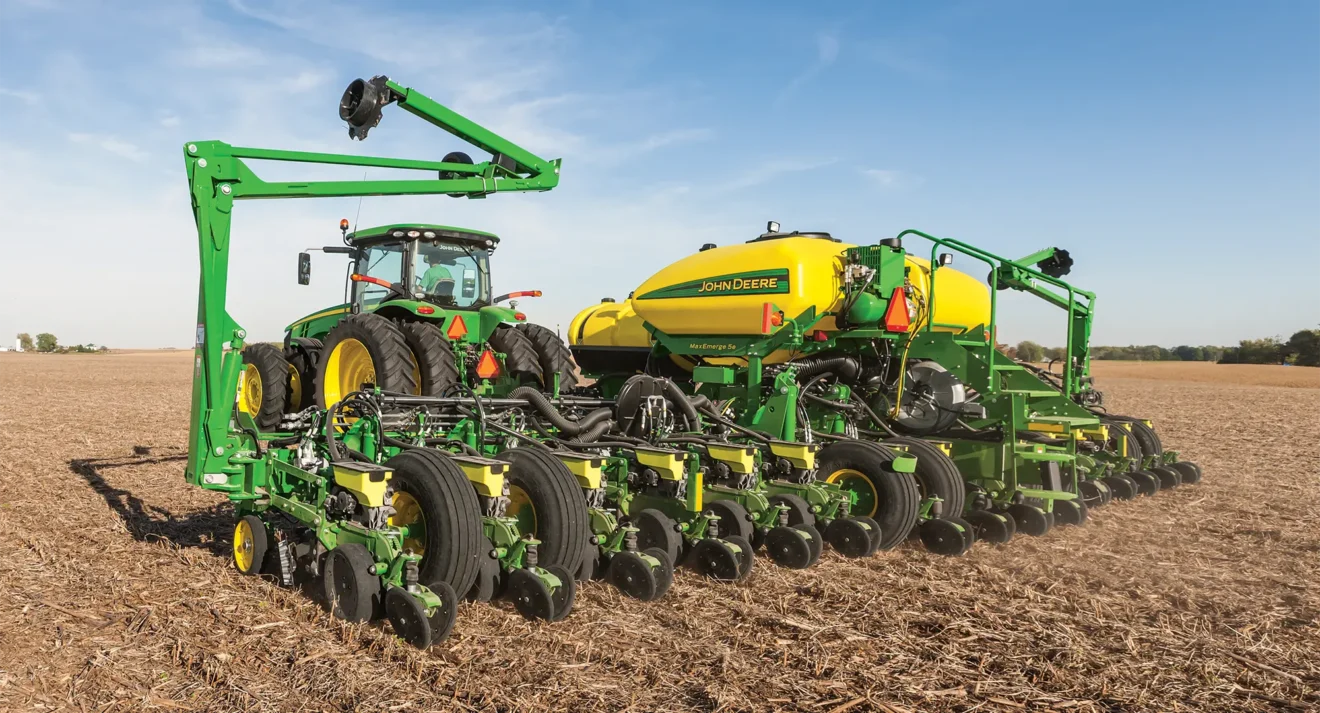 John Deere actual used planting equipment shown in a field