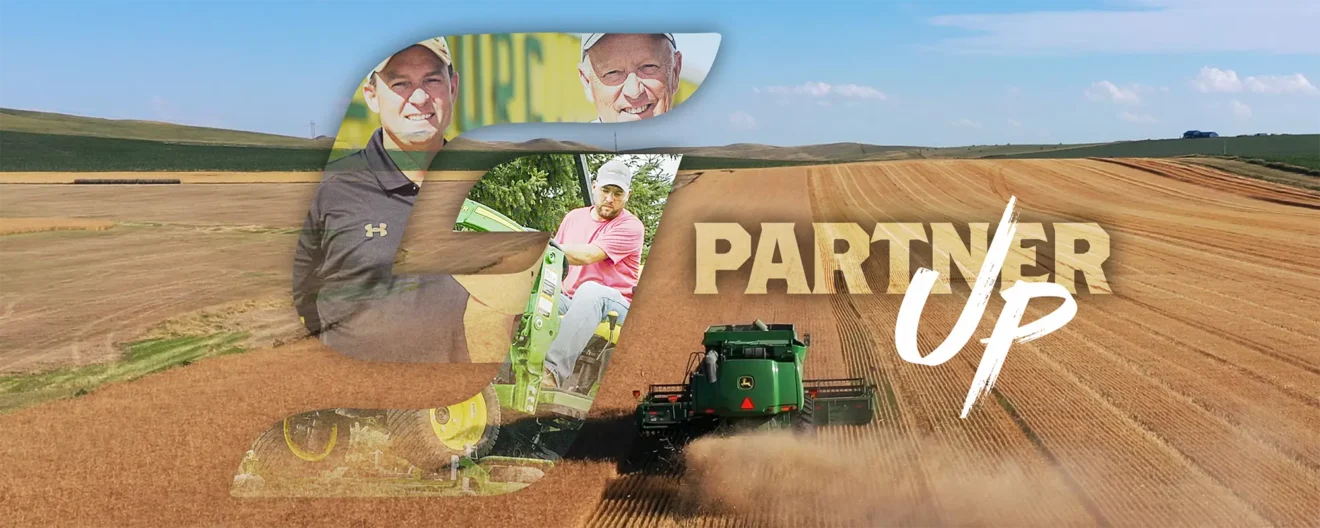 Arial view above a combine harvesting a field