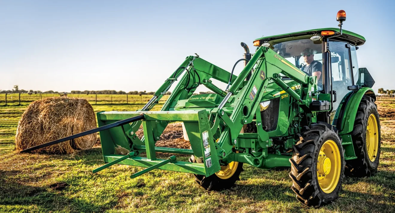 Hay mover working in field