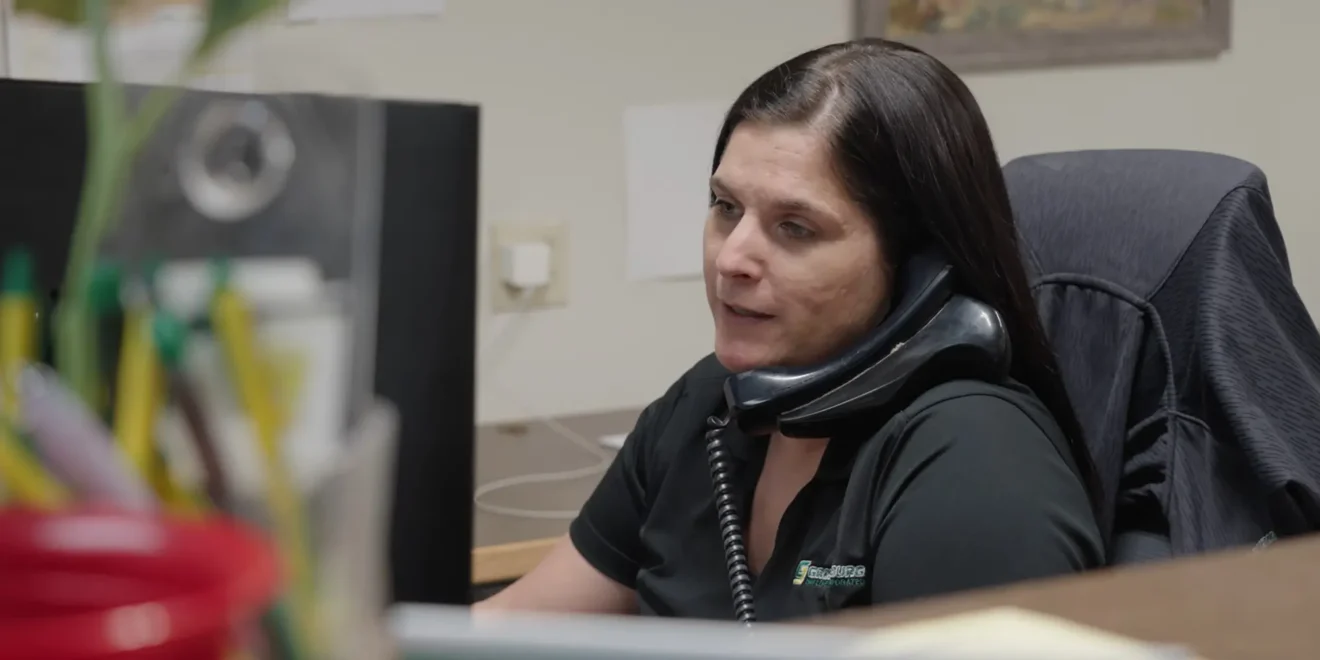 Woman at work taking a phone call